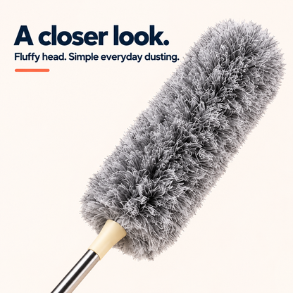 Close-up of the duster's fluffy grey head and cream connector showing its texture